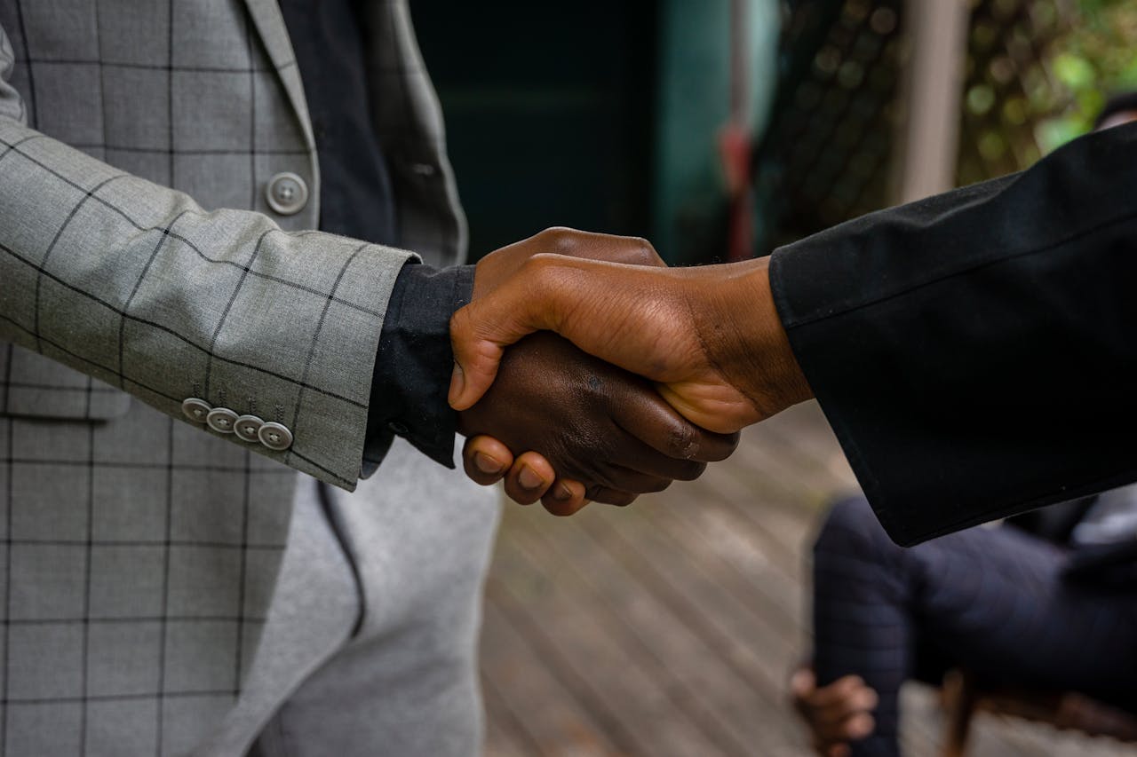 Two professionals shaking hands